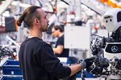 Humans and robots already work hand in hand today. However, increasing digitalisation and automation will change jobs in automotive factories. (Image- Mercedes-Benz)