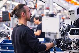 Humans and robots already work hand in hand today. However, increasing digitalisation and automation will change jobs in automotive factories. (Image- Mercedes-Benz)