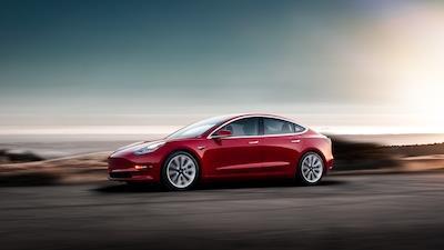 Model3_Red_Driving_Sunset_web