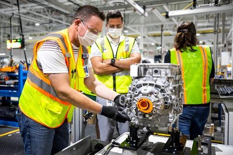 At Ford's Van Dyke Electric Powertrain center AI-powered cameras inspect assemblies, detect defects, and boost quality.