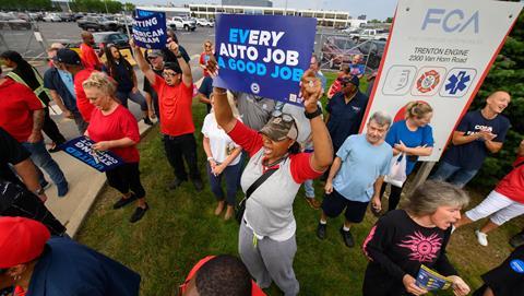 Workers chant together during a UAW rally at the Stellantis Trenton Engine plant in Trenton, September 7, 2023.