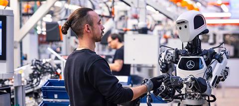 Humans and robots already work hand in hand today. However, increasing digitalisation and automation will change jobs in automotive factories. (Image- Mercedes-Benz)